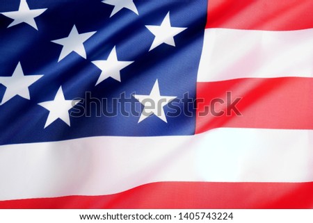 Background of wave flag of the United States of America. Symbol of freedom and independence.