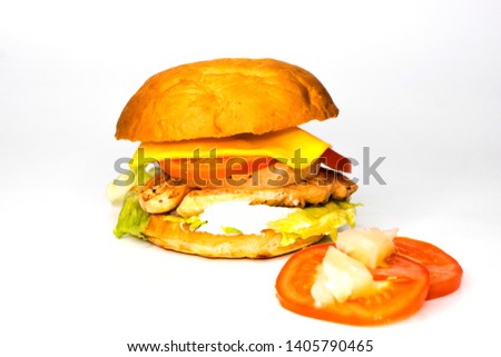 Hamburger with chicken and pineapple. On white background. Close up.