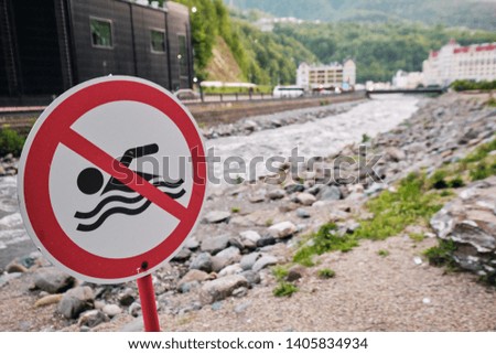 sign swimming is prohibited on the river 