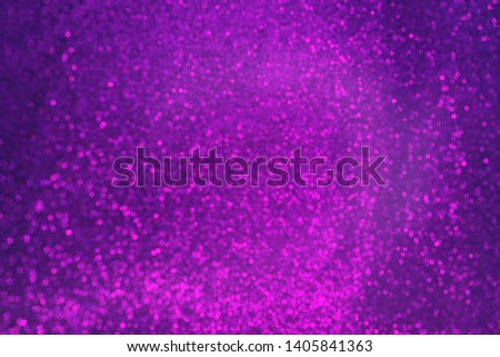 Blurred bokeh light violet pink purple gradient background, Christmas and New Year holidays background. Concept of Color of The Year 2022 Very Peri purple. Party concept. Flat lay.
