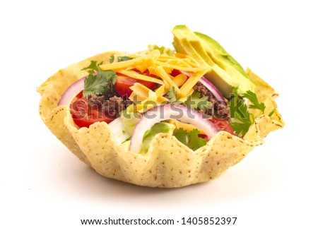 Taco Salad in a Crunch Corn Tortilla Bowl Isolated on a White Background