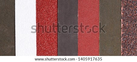 Multicolored multiple models of sandpaper as background