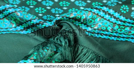 silk fabric of green color with blue and white flowers, dense fabric, bilateral on the basis of triacetate fibers. Texture, Background, Pattern, Decor, Modern, Textile, Art, Design,