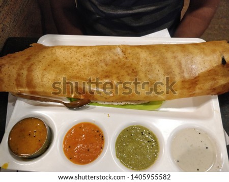 dosa with colourful chutneys. famous plate of Tamilnadu