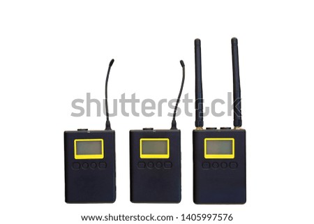 Wireless microphone transmitter for digital camera on white background.