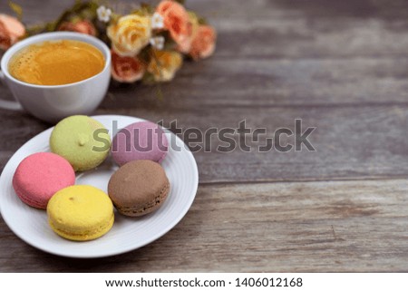 macaron and fresh coffee greeting card and background or presentation
