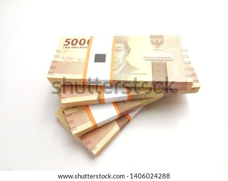 flat lay, stack of bundle 5000 Rupiah Indonesia Money, at White Background