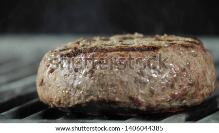 Natural veal burger cutlet cooked on the grill