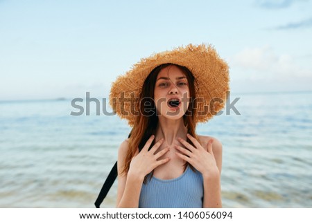 woman in a hat nature trip ocean                               