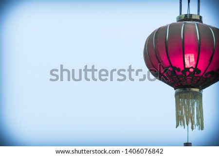 close red lantern with a blue sky background