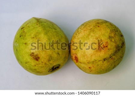 Guava isolated on white background. Top view close up details.