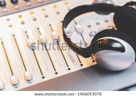 headphone on mixing console. music concept