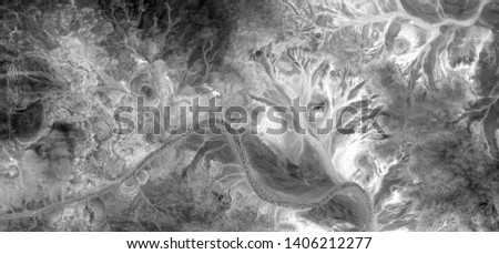 spring, allegory, abstract naturalism, Black and white photo, abstract photography of landscapes of the deserts of Africa from the air, aerial view, contemporary photographic art, 