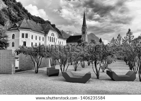 Vaduz, Liechtenstein. Old building of parliament and Cathedral of St. Florin in  Vaduz, Liechtenstein.