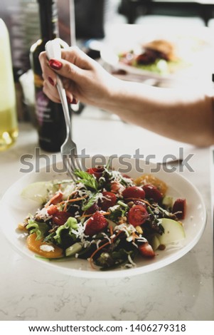 Fresh salad on white plate