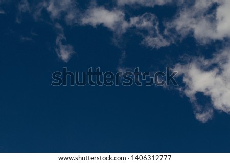 Sky with clouds. Deep blue sky .Bright blue cloudscape. Nature picture for background. Clear space for text.