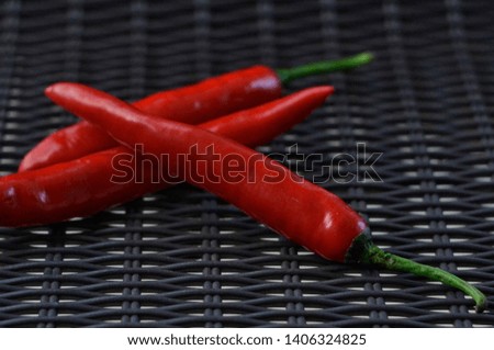 spicy chilli pepper on the wicker background
