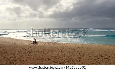 Alone on a rough beach