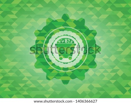 Bitcoin mining trolley icon inside green emblem with mosaic background