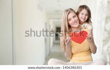 Happy mother and child n the bedroom