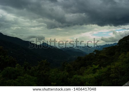 Green valley landscape and cloudscape