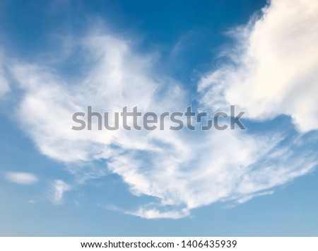 Air clouds in the blue sky. Nature background