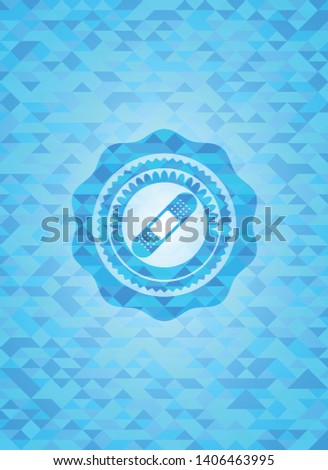 bandage plaster icon inside light blue emblem with mosaic ecological style background