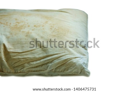 Dirty pillow isolated on white background, are a source of germs and dust mites and mattresses