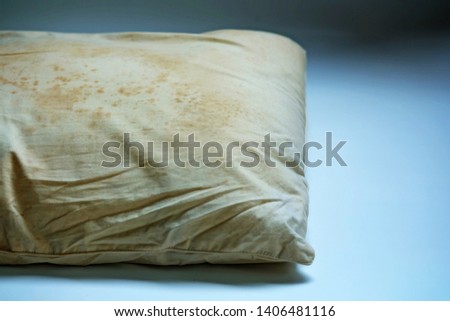 
Close up Stains on dirty pillow are a source of germs and dust mites and mattresses, Selective Focus