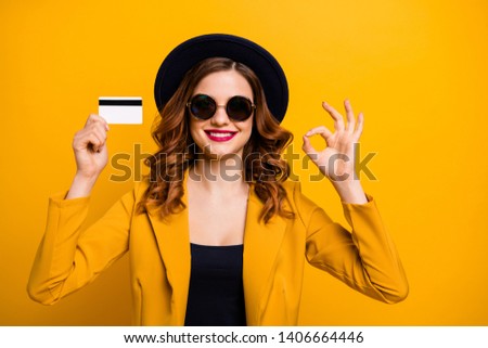 Close up photo beautiful she her lady hands arms credit plastic card show okey symbol advising vacation traveler buyer sale discount wear specs formal-wear suit isolated yellow bright background
