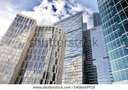 Office and residential skyscrapers. Commercial real estate. Modern facade design. Modern business city district. Economic and business growth. Financial city district. Modern urban architecture.