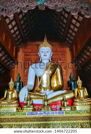 Beautiful Buddha statue at Buddhist Temple Wat Ban Den. Located in Mae Taeng,Chiang Mai,Thailand. Translation the Thai letters in Picture is "Donor's Name"