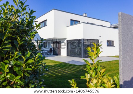 modern house building rooftop at april spring month in south germany Royalty-Free Stock Photo #1406745596
