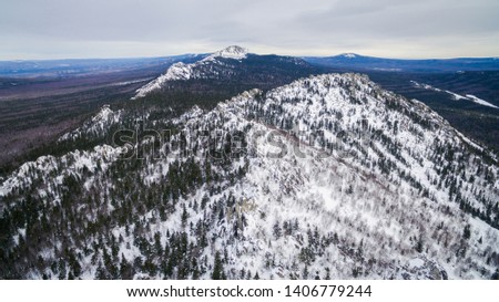 Ural range in winter day view from drone in taganay national park