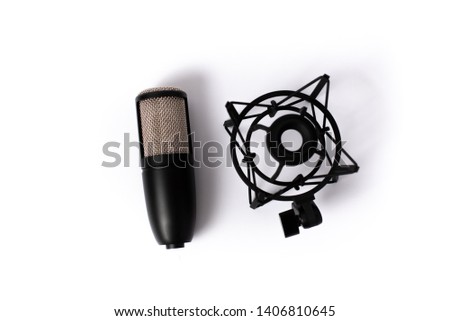 Condenser microphone and spider shock mount, microphone Studio record on white back ground, isolate background.