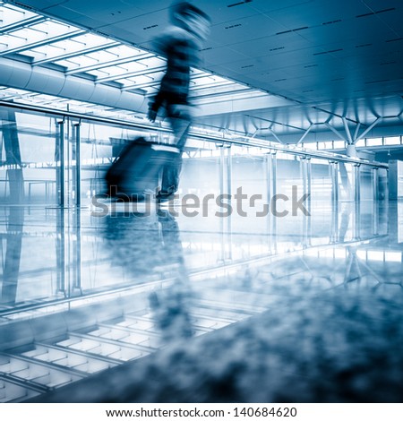 Futuristic  Airport interior people walking in motion blur