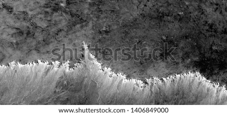 live border, allegory, abstract naturalism, Black and white photo, abstract photography of landscapes of the deserts of Africa from the air, aerial view, contemporary photographic art, 