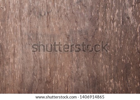 Brown wood with texture and some scratched by the passage of time