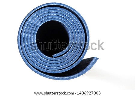 deep blue yoga mat on the white back ground 