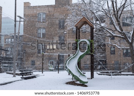 Playground in winter with snow