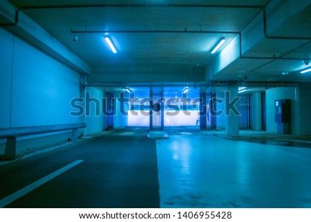 Empty parking lot in blue light