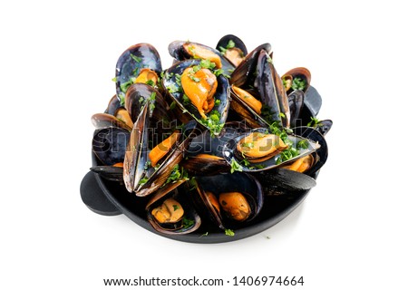 Delicious seafood mussels with  parsley sauce and lemon. isolated on white background Royalty-Free Stock Photo #1406974664