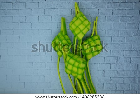 four pieces of kulit ketupat (rhombus) for making rice cake, especially food for indonesian people celebrating ramadhan and Eid al-Fitr (idul fitri)