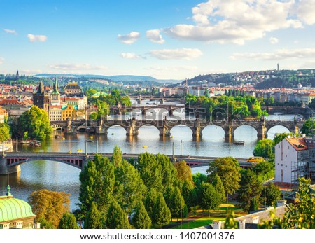 Row of bridges in Prague at summer day Royalty-Free Stock Photo #1407001376