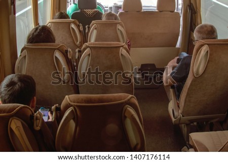 Passengers travel in a minibus, travel and rest
