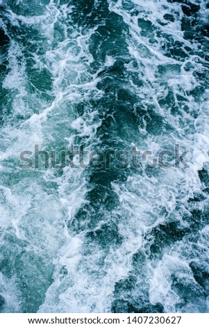 Abstract water ocean waves texture background. surface of sea wave splash and foam.
