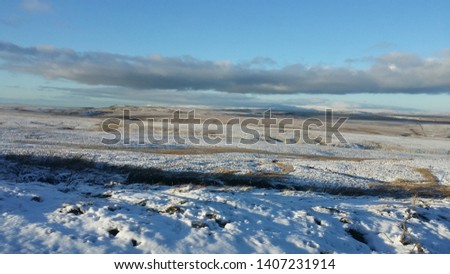 Beautiful white snow, sunny and blue sky background at Arkengarthdale, North Yorkshire