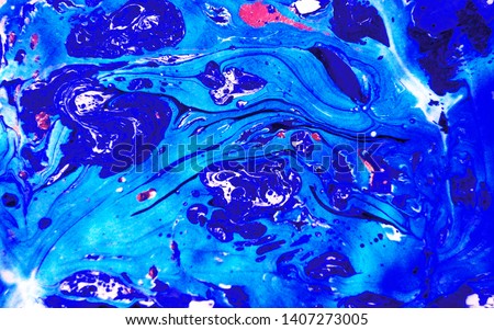 Phototography of a beautiful marbled texture. Turkish Paper Marbling or Ebru Technique with colorful ink, aqueous surface design with patterns similar to smooth marble or other kinds of stone.