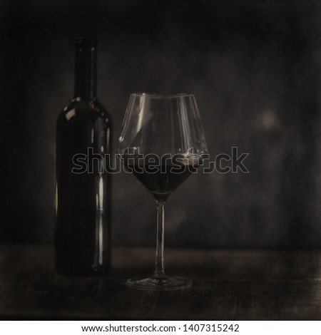 glass of red wine / vintage background, old cask wine, alcohol tasting