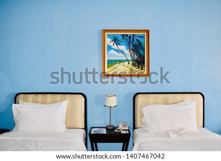 Interior of Bedroom of Two bedded hotel room in Chaung Tha Beach of Myanmar